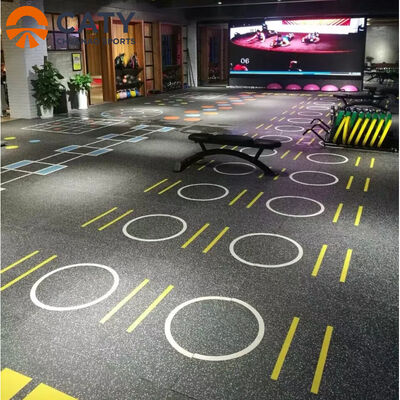 Système de revêtement de sol fonctionnel polyvalent, intégré à des zones d'absorption des chocs, d'haltérophilie et de cardiologie